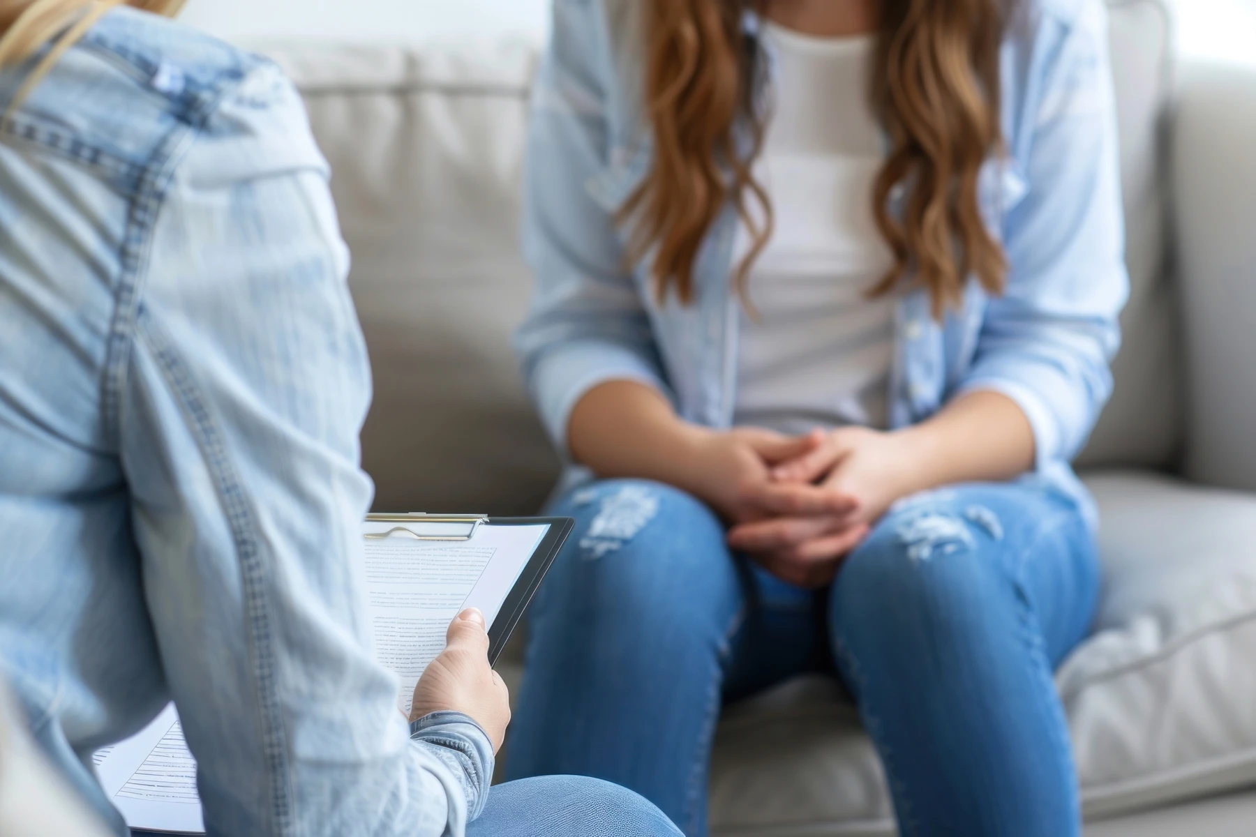 therapist and adolescent client talking