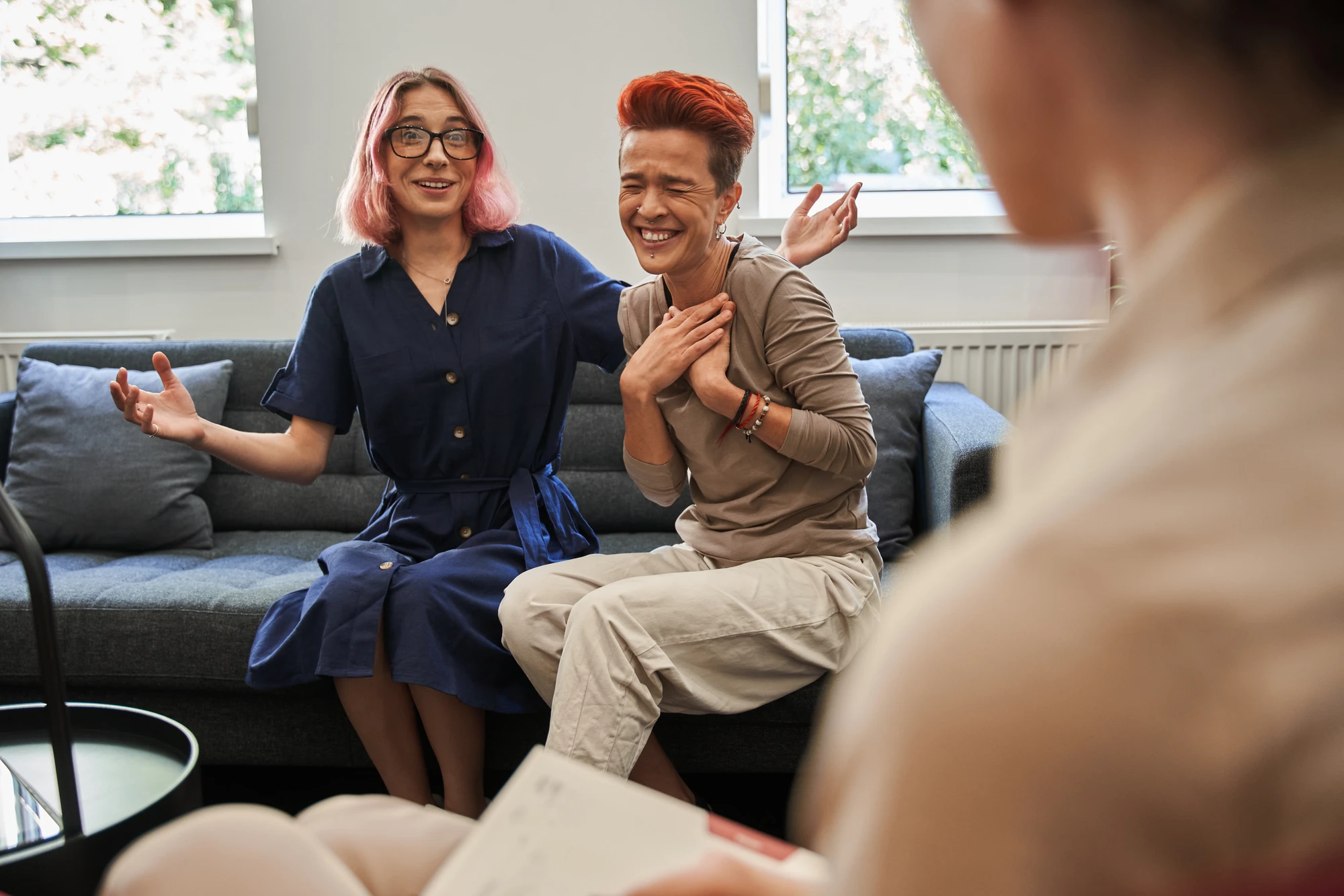 therapist and lesbian couple talking